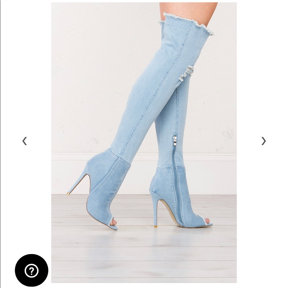 Over the knee distressed denim boots